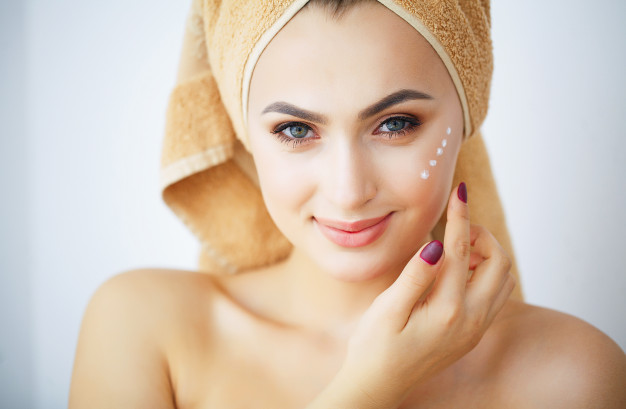 beauty-care-portrait-girl-with-brown-towel-head_118454-2486