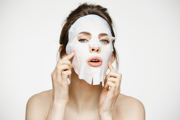 young-woman-with-facial-mask-beauty-spa-cosmetology_176420-14115