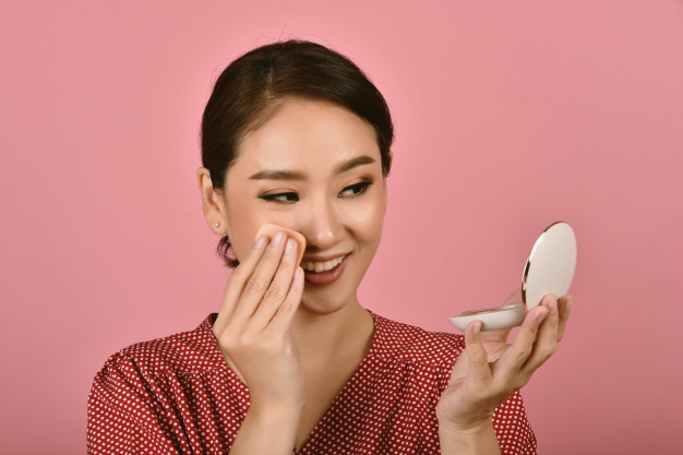 asian-woman-applying-makeup-cosmetics_175175-262